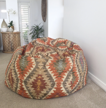 Bean bag cover with afghan material and filled with beans