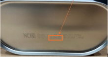 Location of the batch date highlighted on the bottom of a tin of MotoMix