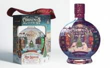 Packaging and bottle in the shape of a Christmas themed globe, containing gin
