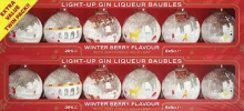 Package of six bauble-shaped bottles of gin with Christmas designs