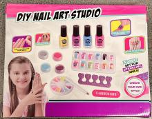 Back of the nail art studio packaging, depicting all of the included products