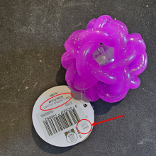 Tag on the spaghetti ball showing where to locate the batch number