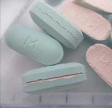 Photograph of Tenofovir Disoproxil Emtricitabine Mylan Broken/Split Tablets