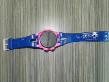Photograph of Toy Watch showing underside of Watch