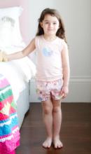 child wearing Charlotte pyjamas